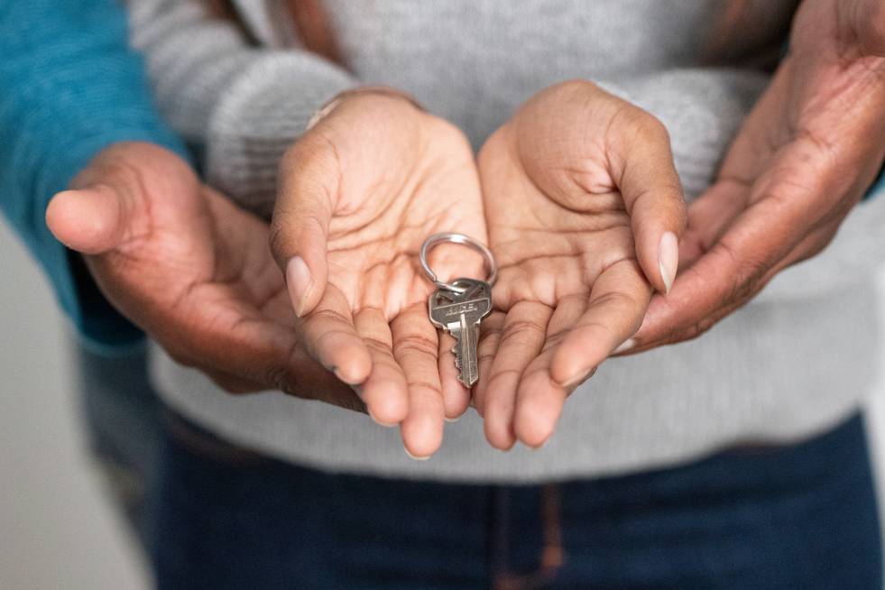 couple holding house keys